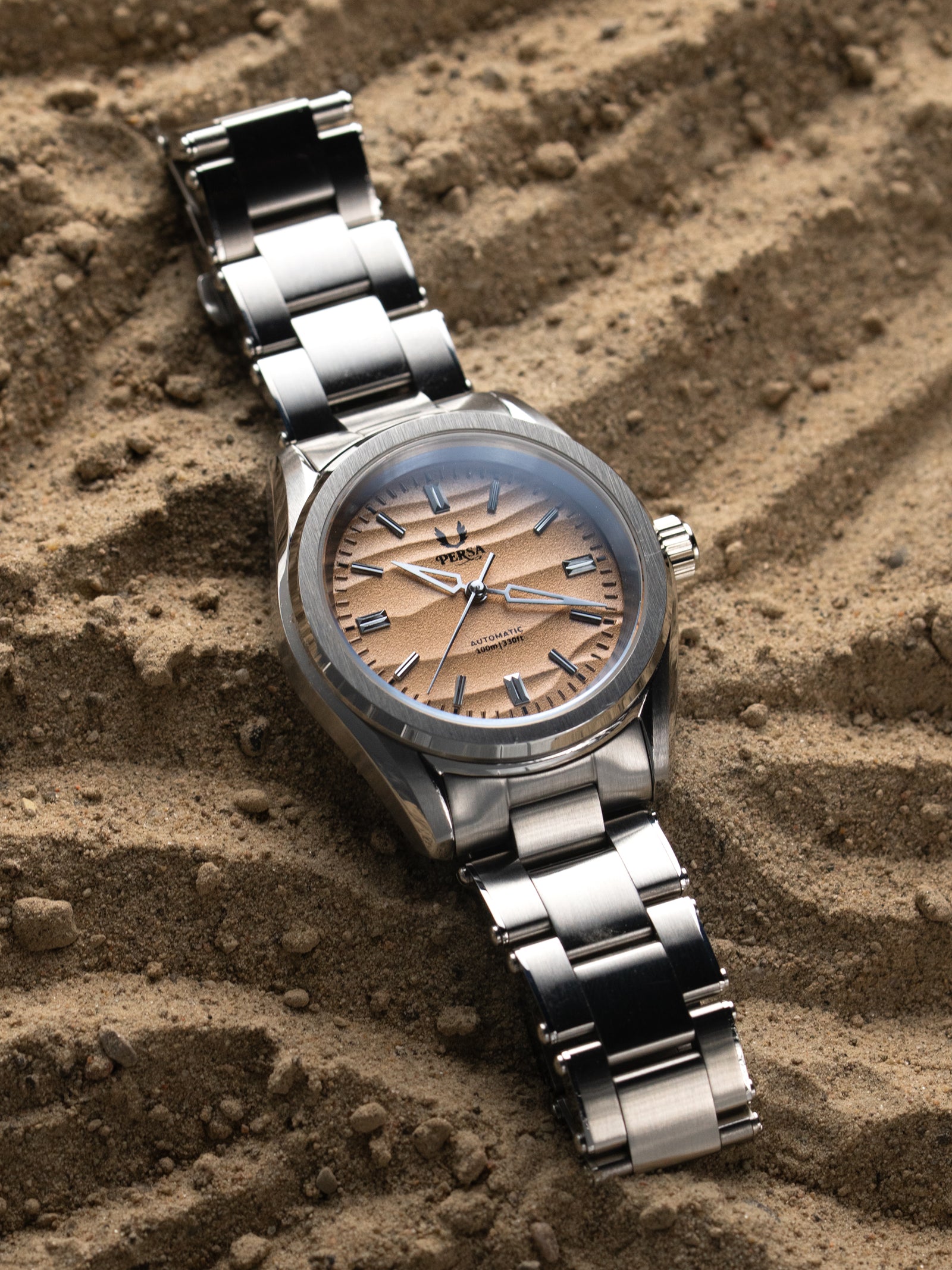Mirage stainless steel watch on wrist